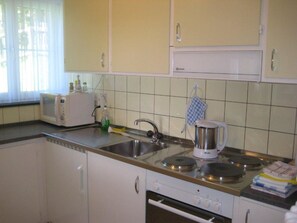 Fridge, microwave, oven, cookware/dishes/utensils - Ferienwohung Cavegn-Deplaz, (Sedrun), 126.01 by Interhome (Sedrun)