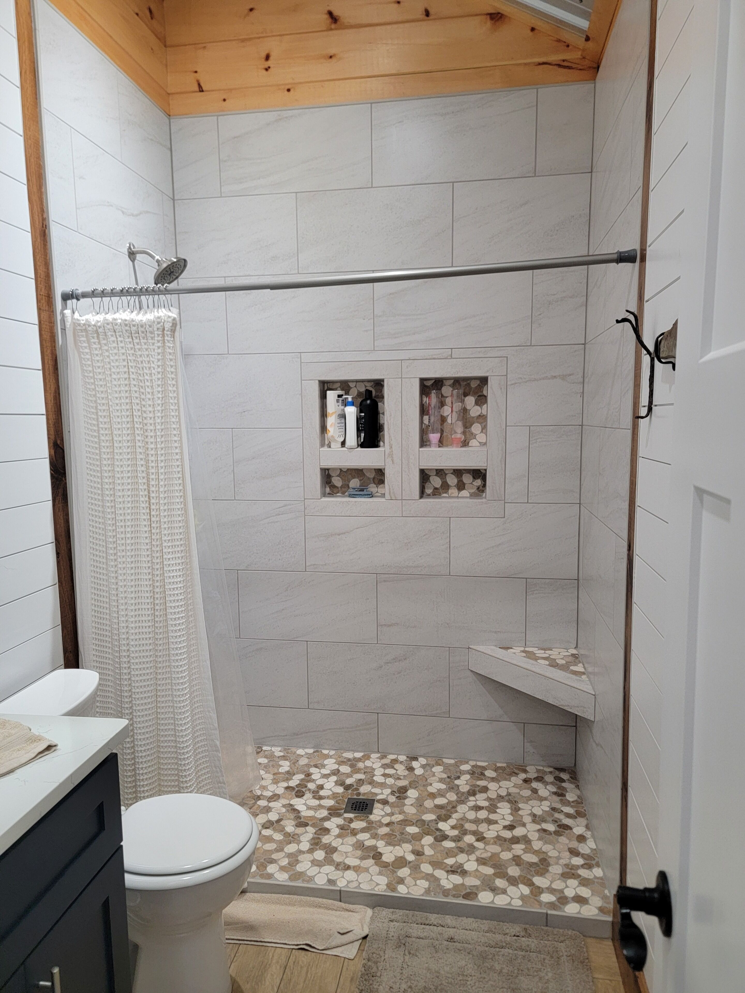 Shower, towels, soap, toilet paper