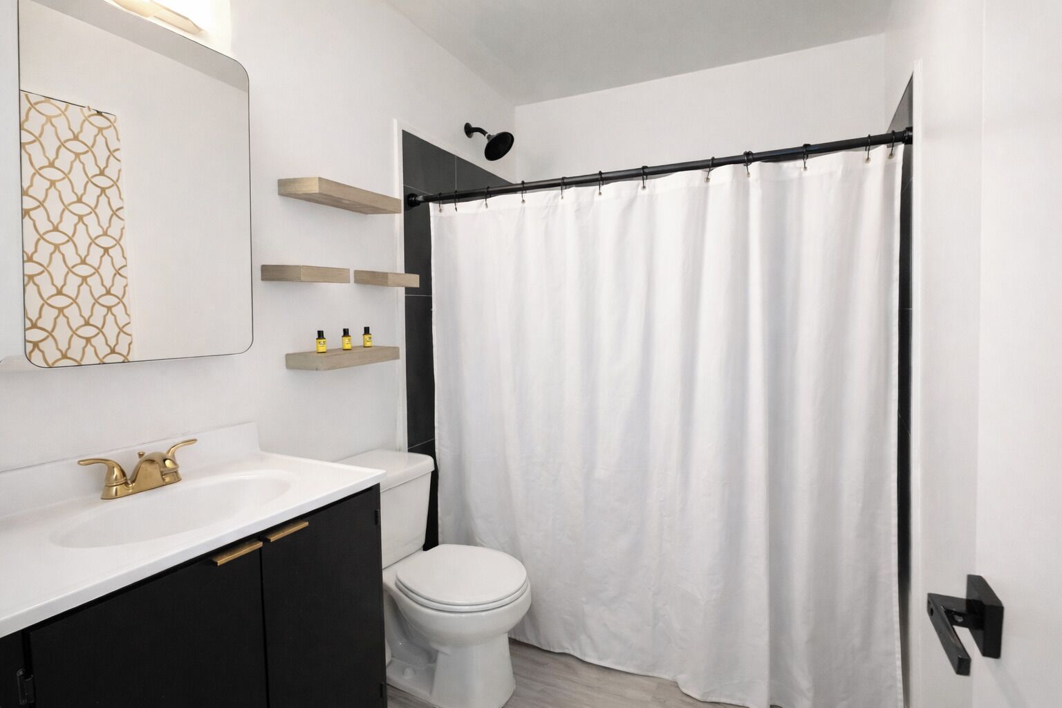 Shower, towels, soap, toilet paper