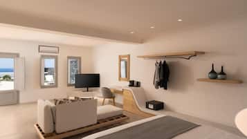 Quarto moderno com cama, escrivaninha, cadeira, televisão e vista para o mar.