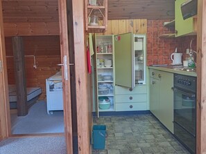 Fridge, oven, cookware/dishes/utensils