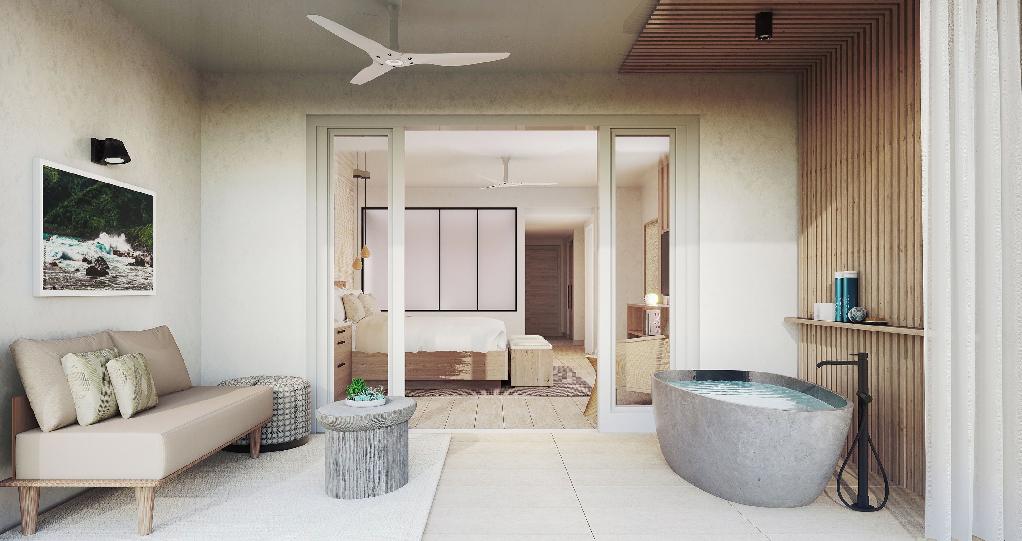 A modern bedroom with a bed, a sitting area with a sofa, a large bathtub, and a ceiling fan.
