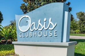 A sign for Oasis Clubhouse at ChampionsGate. - Champions Gate Resort Townhomes (Davenport)
