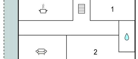 Un plan d’étage comprenant deux pièces, une kitchenette et une salle de bain.