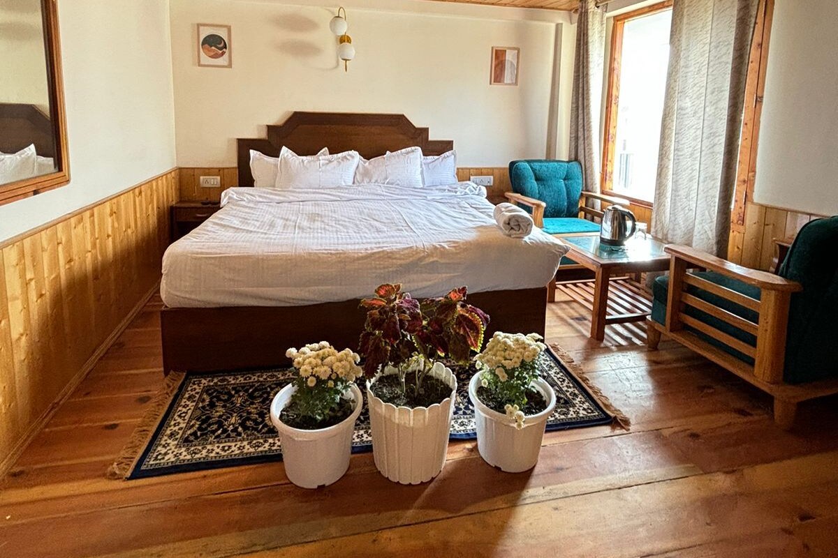 Luxury suite with personal balcony and mountain views