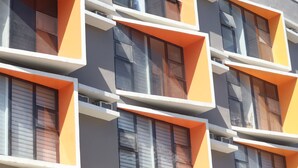A modern building with multiple balconies and large windows. - The Pad Co-living (Cebu City)