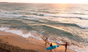 A beach with waves and surfers. - Ikos Kissamos (Kissamos)
