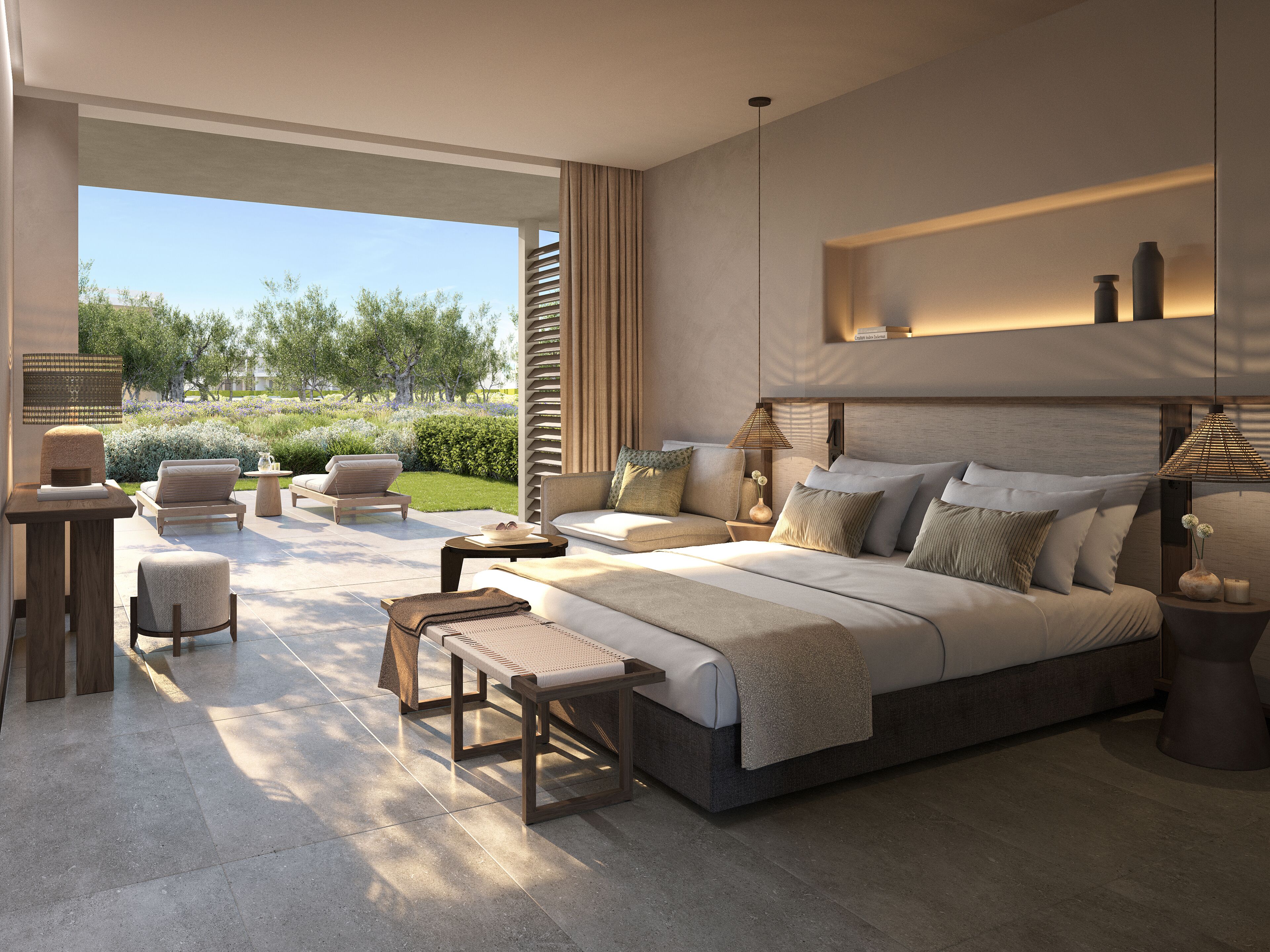 A modern bedroom with a large bed, a seating area with a sofa and chairs, and a view of a garden.