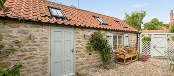 A holiday cottage that sleeps 10 guests in 5 bedrooms