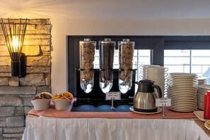 A breakfast buffet setup with cereal options, a coffee station, and a sign indicating cold milk. - MR. Beyaz Boutique Hotel (Istanbul)