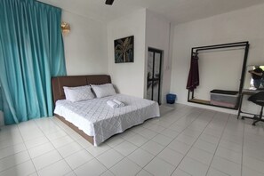 A bedroom with a bed, a door, a window, and a mirror. - Aeden Villa Roomstay & Homestay By Zuzu (Kuala Kangsar)