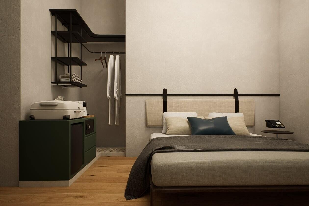 A bedroom with a bed, a bedside table, a wardrobe, and a shelf unit.