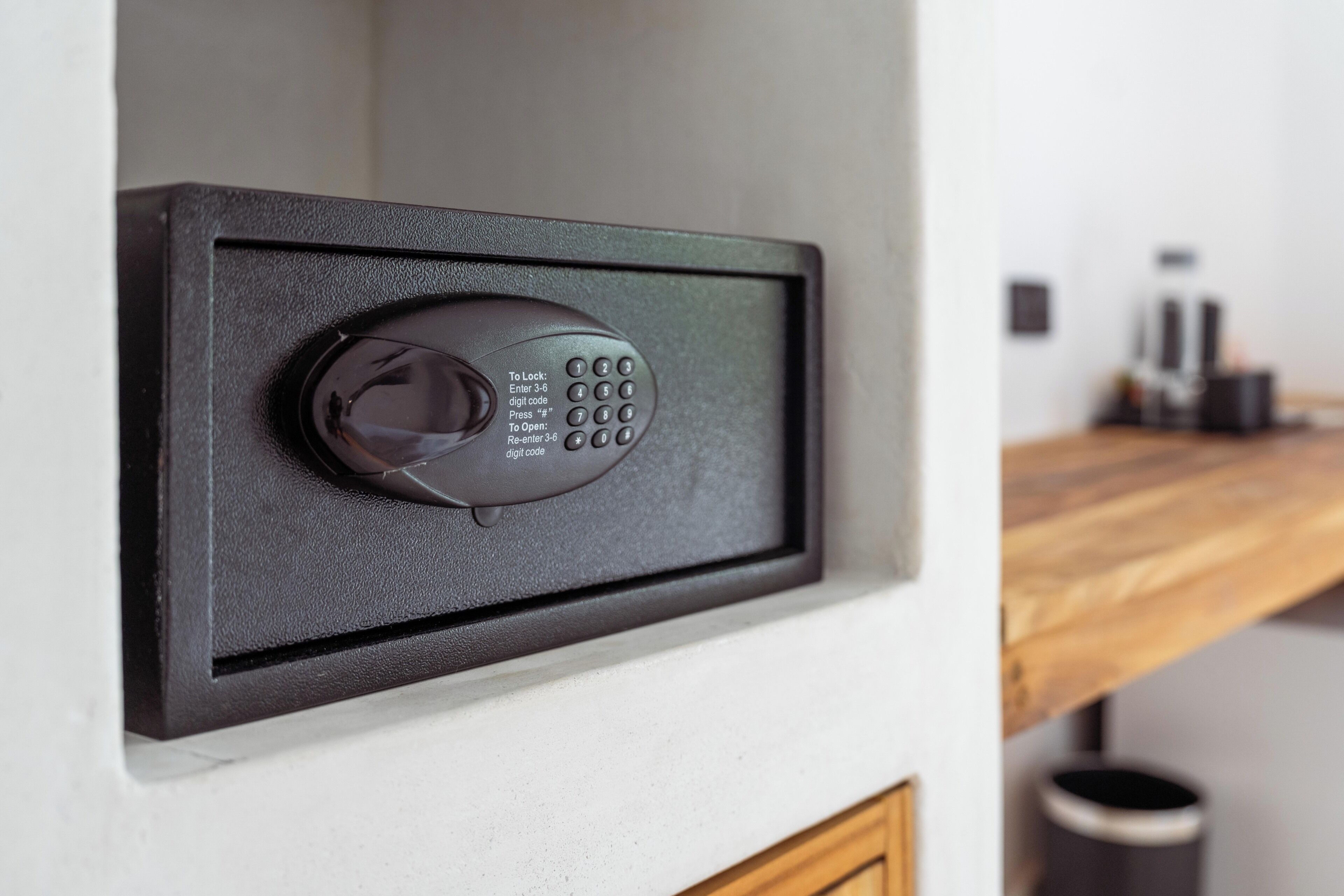 A digital lock on a door with instructions for entering a code.
