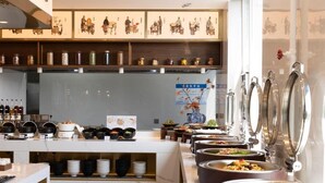 A buffet area with various food stations and a selection of beverages. - Nostalgia S Hotel(beijing Tianqiao (Beijing)