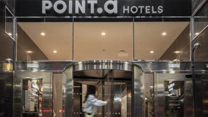 The entrance of a hotel with a glass facade, a sign reading 'POINT.A HOTELS', and an elevator. - Point A Hotel Edinburgh, St Andrew Square (Edinburgh)