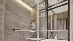 A modern bathroom with a glass shower enclosure, a vanity with a mirror, and a towel rack. - Orange Hotel - Hanzhong Taipei (Taipei)