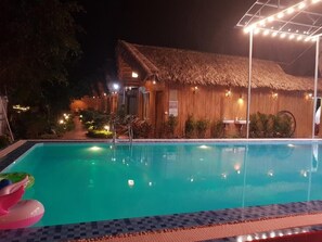 Bangalô luxo, vista para o jardim | Piscina | Piscina externa