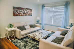Living area - Beyond Oasis - Gaming Room, BBQ, Outdoor Firepit (cowes)