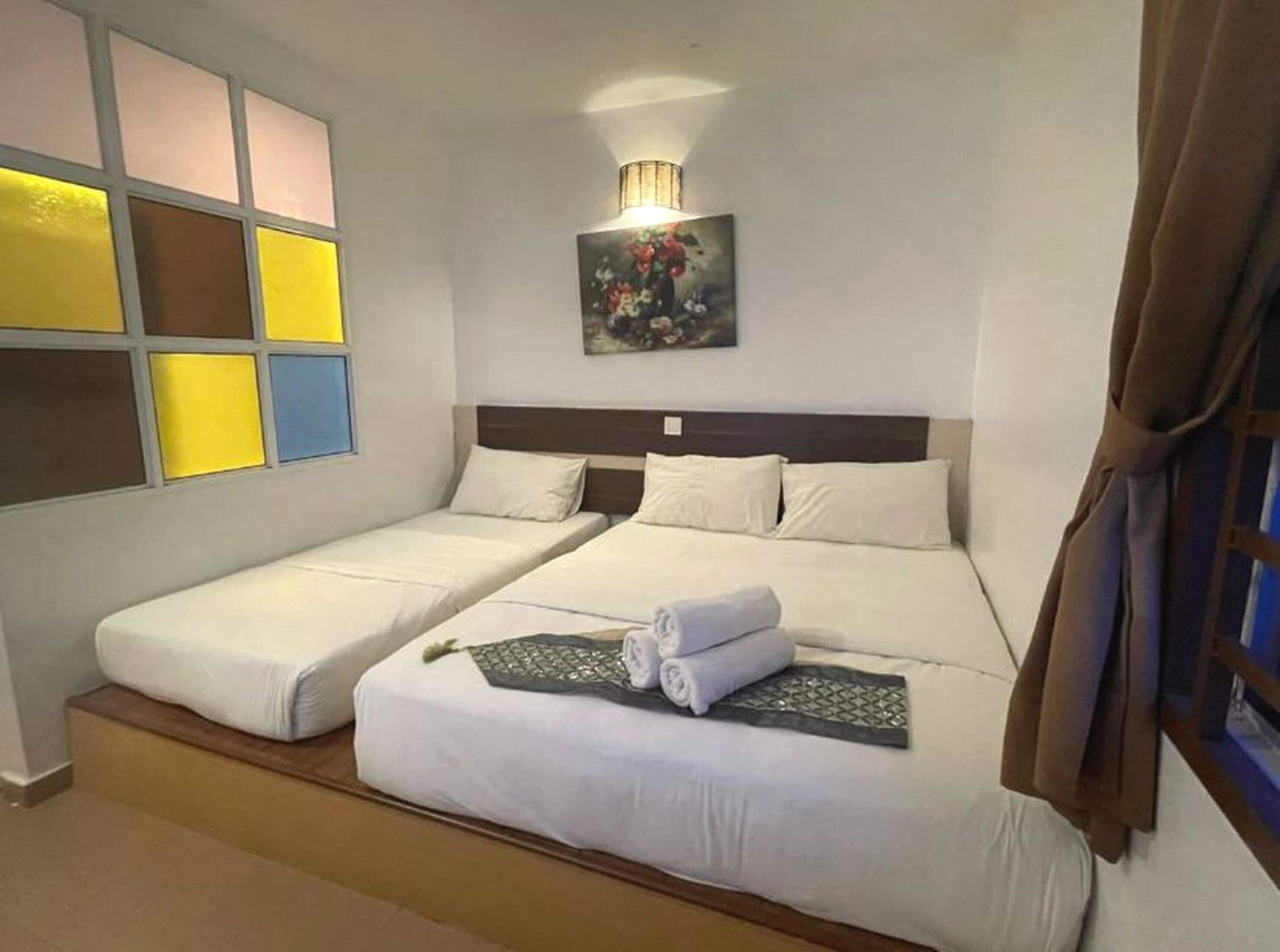 Laptop workspace, free WiFi, bed sheets