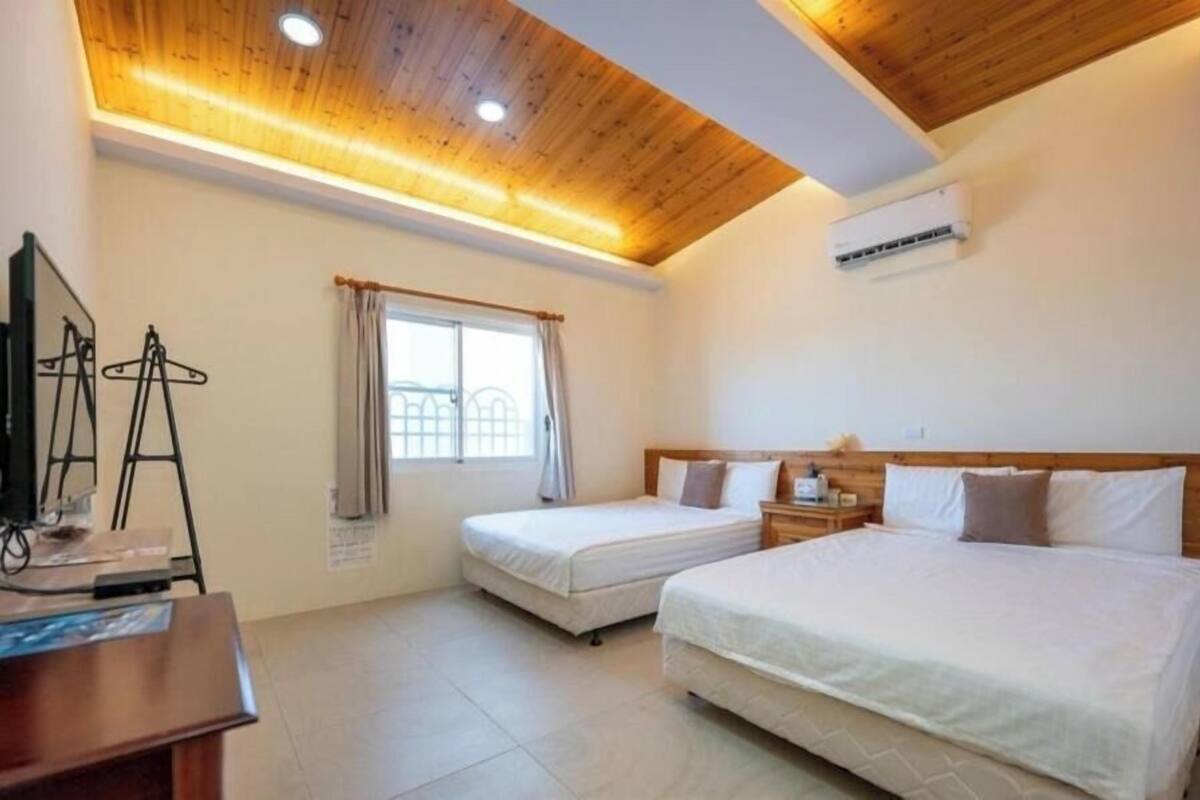 Standard Quadruple Room, City View | Blackout drapes, soundproofing, free WiFi