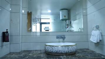 Shower, jetted tub, hair dryer, towels
