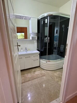 Shower, jetted tub, hair dryer, bidet