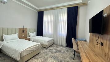 Twin Room, City View | Desk, laptop workspace, blackout curtains, soundproofing
