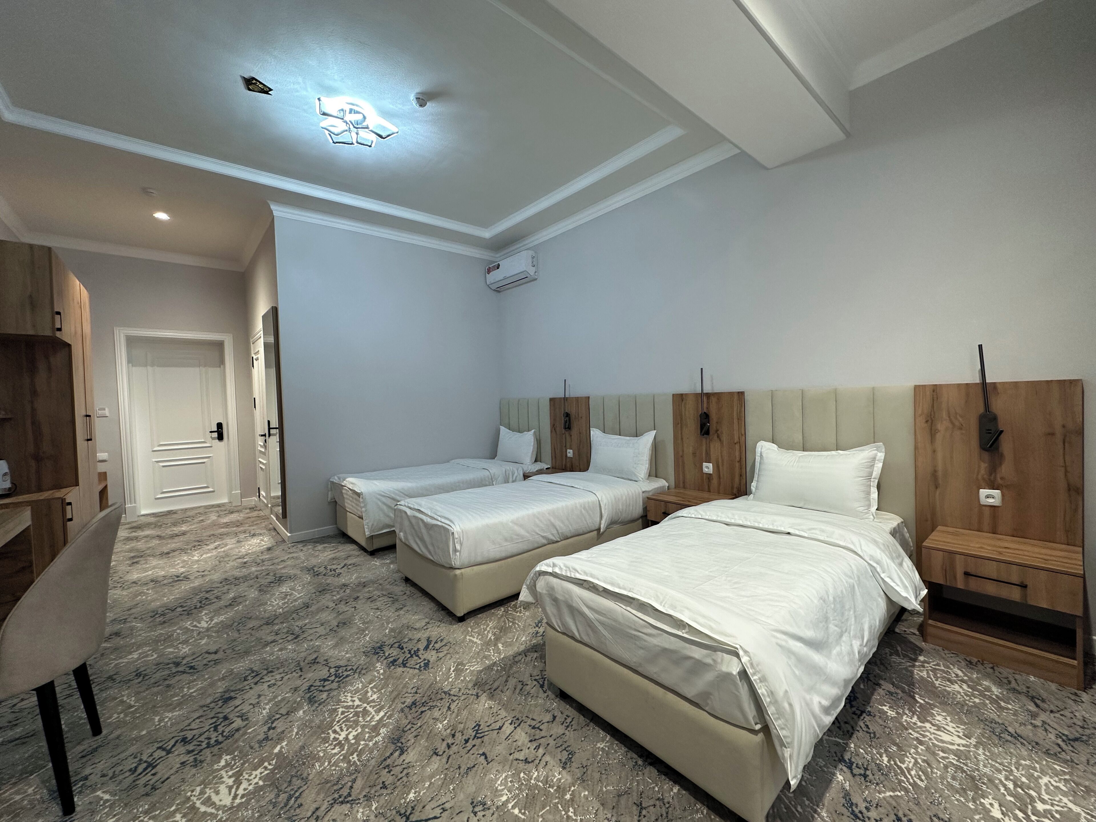 Triple Room, City View | Desk, laptop workspace, blackout curtains, soundproofing