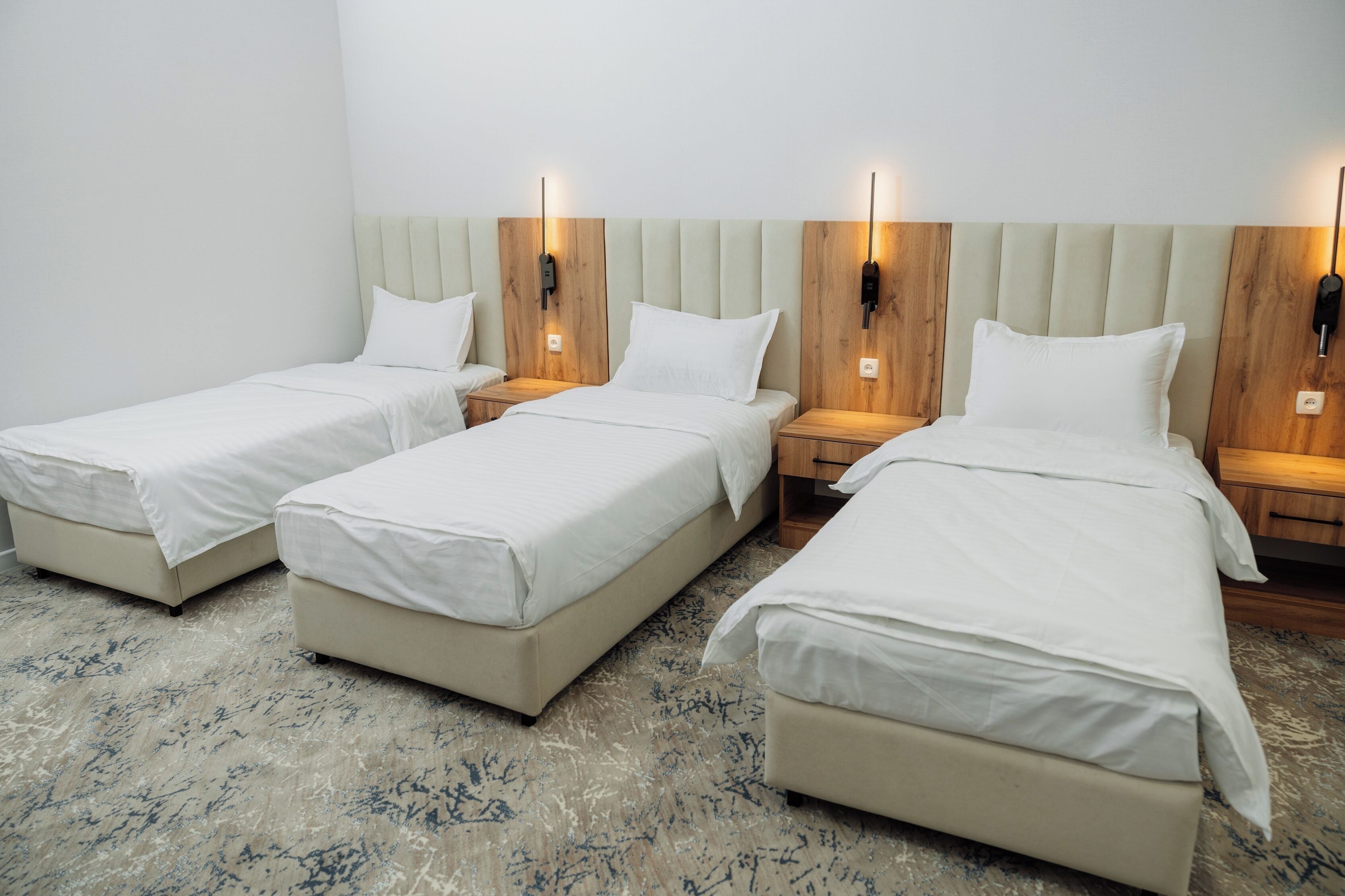 Premium bedding, desk, laptop workspace, blackout curtains