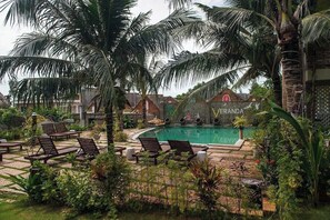 Deluxe Room, Garden View | Pool | Outdoor pool