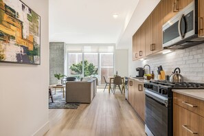 Fridge, microwave, oven, stovetop - Gym + Rooftop Deck + Pool + Spa | Little Italy Locale | Ancora by AvantStay (San Diego)