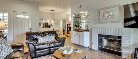 TV, fireplace, books