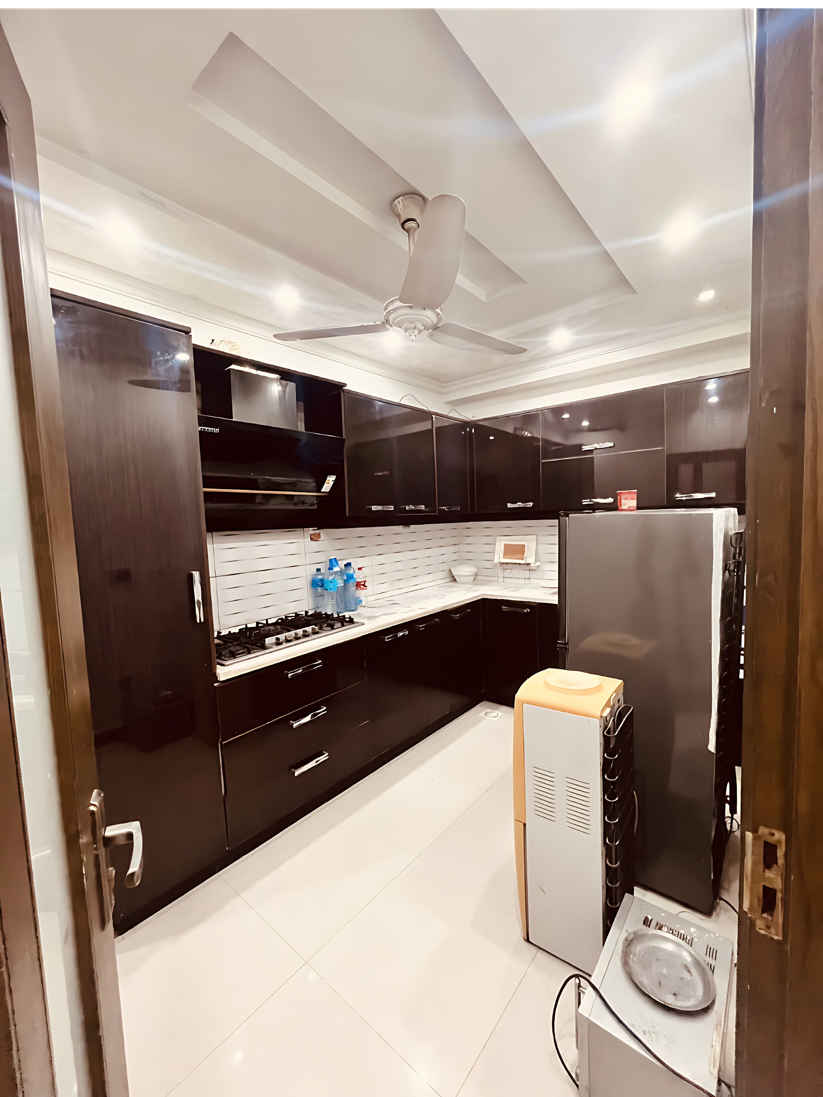 Fridge, stovetop, cookware/dishes/utensils, cleaning supplies
