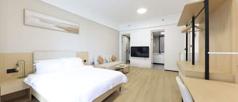 Habitación doble ejecutiva, vista a la ciudad | Edredón, escritorio y espacio para trabajar con laptop