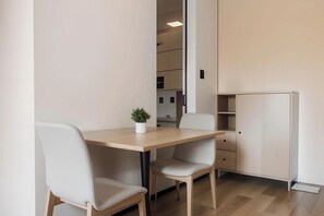 Suite ejecutiva, vista a la ciudad | Sala de estar