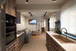 Giardino Beachfront | Living area | Smart TV