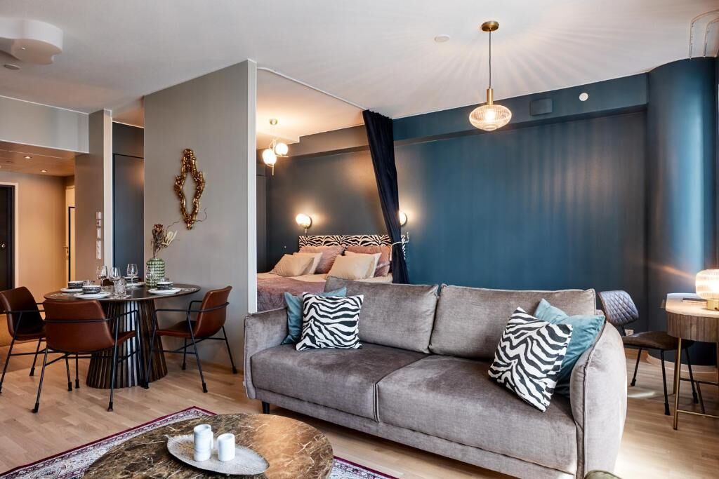 Superior Apartment, Air conditioning, City View | Living area | 55-inch TV with cable channels, heated floors