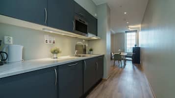 Basic Triple Room | Private kitchen