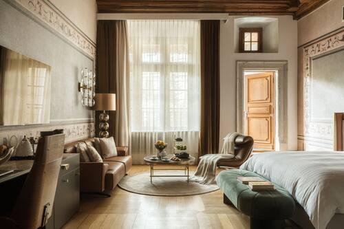 Junior Suite with Balcony Courtyard View | Premium bedding, free minibar items, in-room safe, laptop workspace