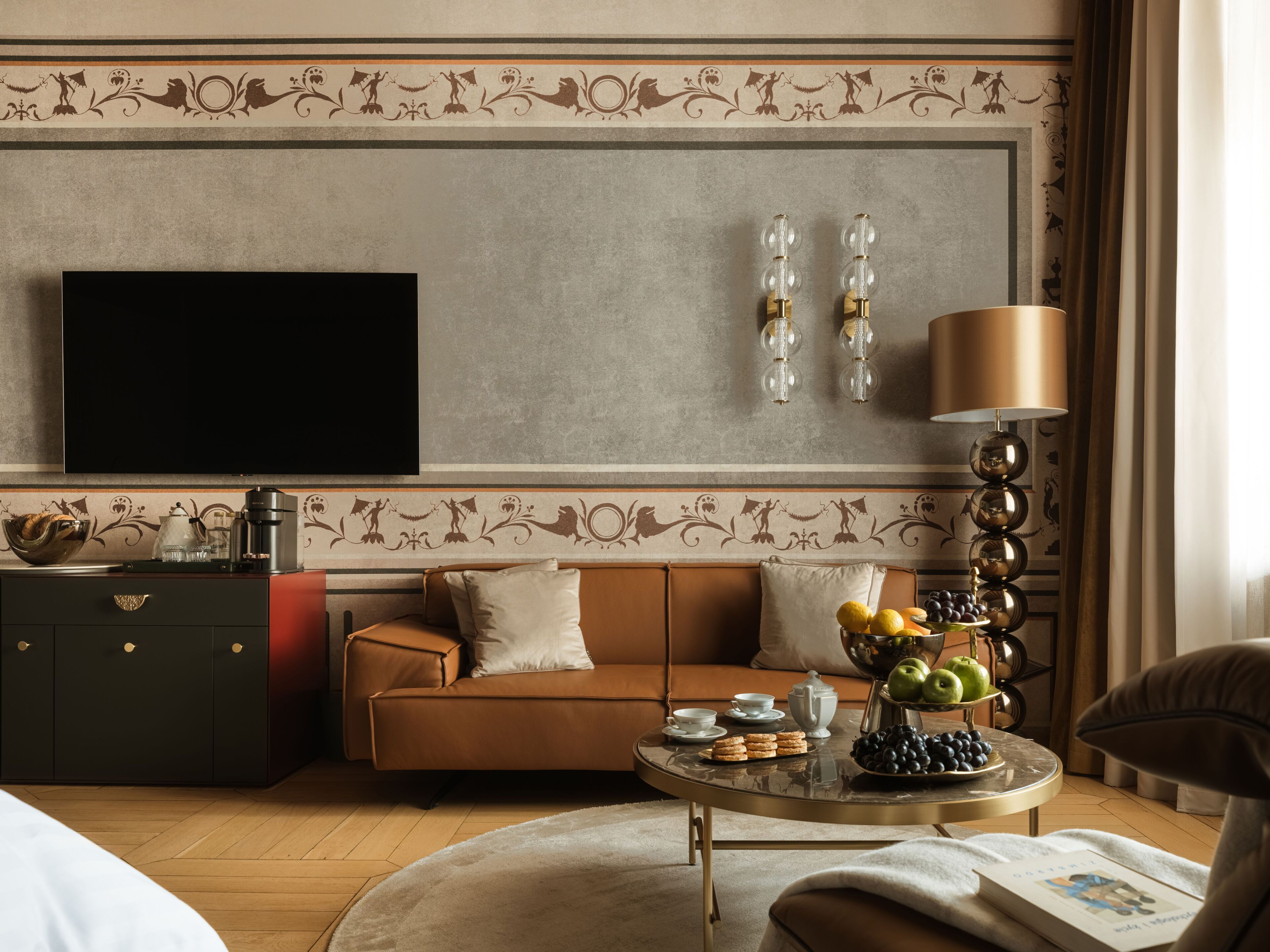 Junior Suite with Balcony Courtyard View | Living room | 65-inch Smart TV with cable channels