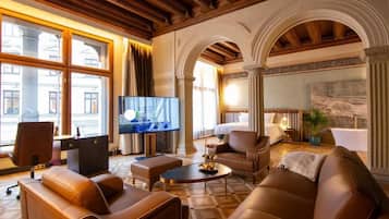 Premium bedding, free minibar items, in-room safe, laptop workspace