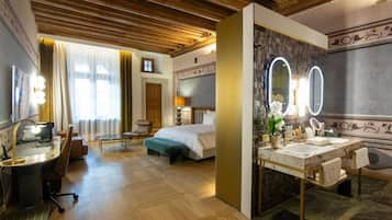 Premium bedding, free minibar items, in-room safe, laptop workspace