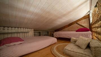 1 slaapkamer, een strijkplank/strijkijzer, wifi, beddengoed