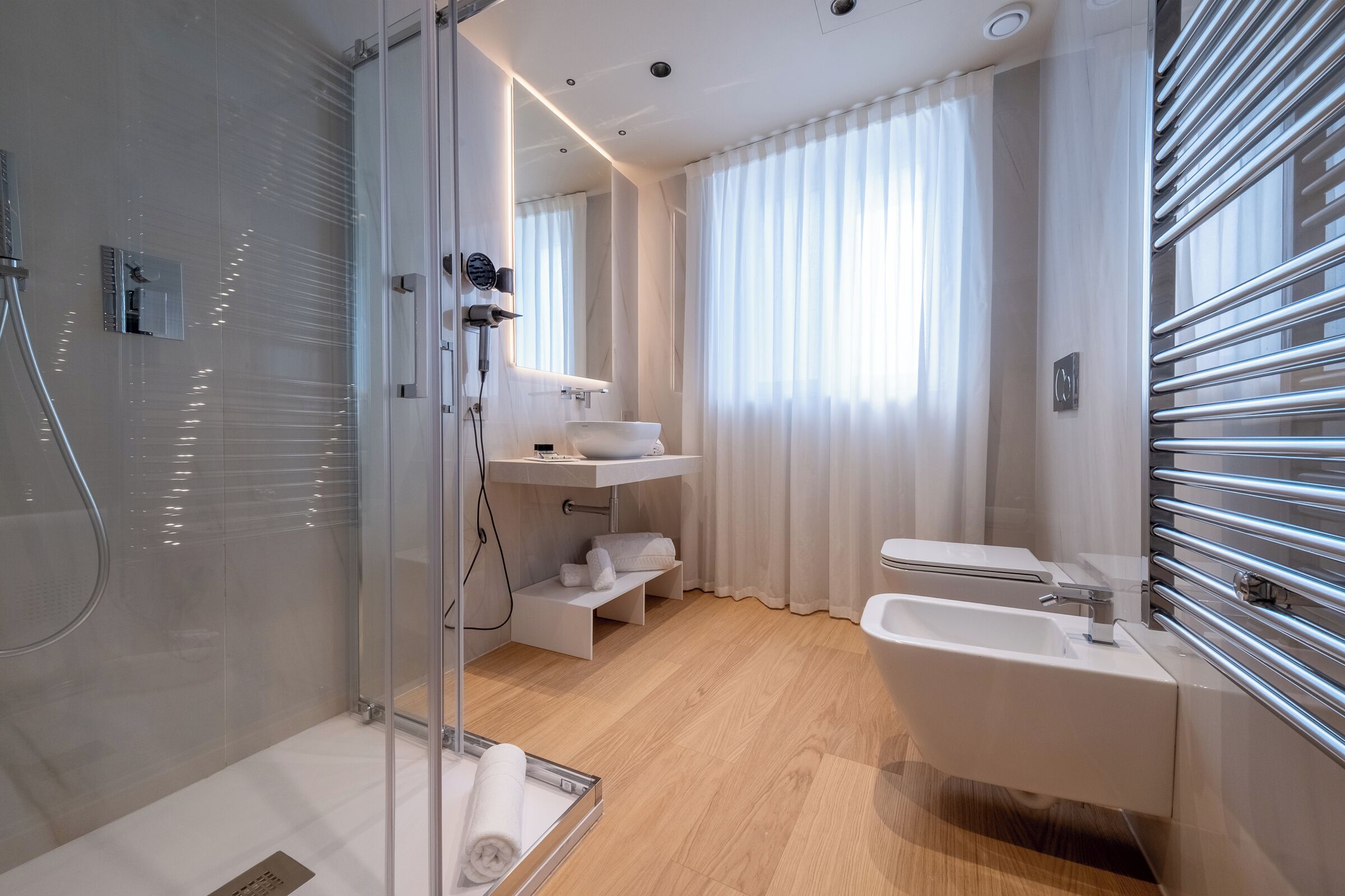 Shower, free toiletries, hair dryer, slippers