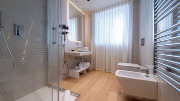 Shower, free toiletries, hair dryer, slippers