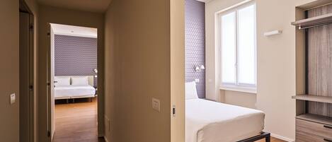 Two Bedrooms Deluxe Apartment | Hypo-allergenic bedding, in-room safe, desk, laptop workspace