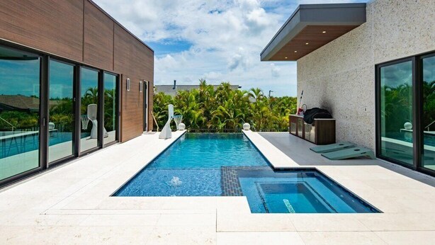Pool - 4BR Marco Island home with heated pool, WiFi, and full kitchen. (Marco Island)