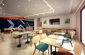 A modern interior with tables and chairs arranged for dining. - ibis budget Guingamp - Coeur de Bretagne (October 2026) (Ploumagoar)