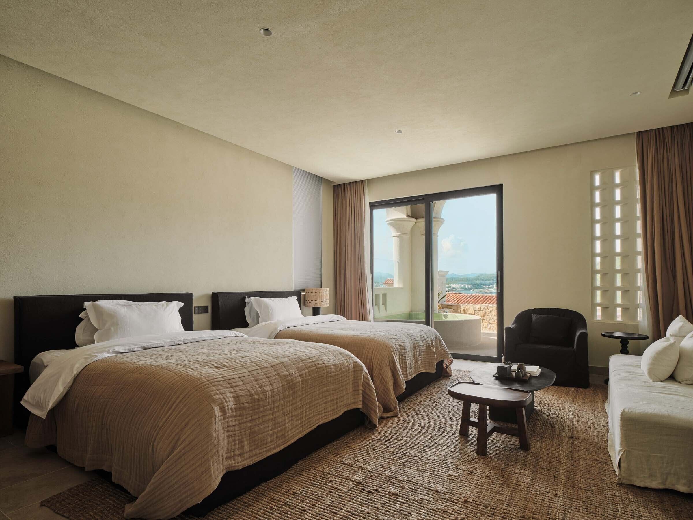 Family Twin Room, Sea View | Minibar, individually decorated, individually furnished, desk