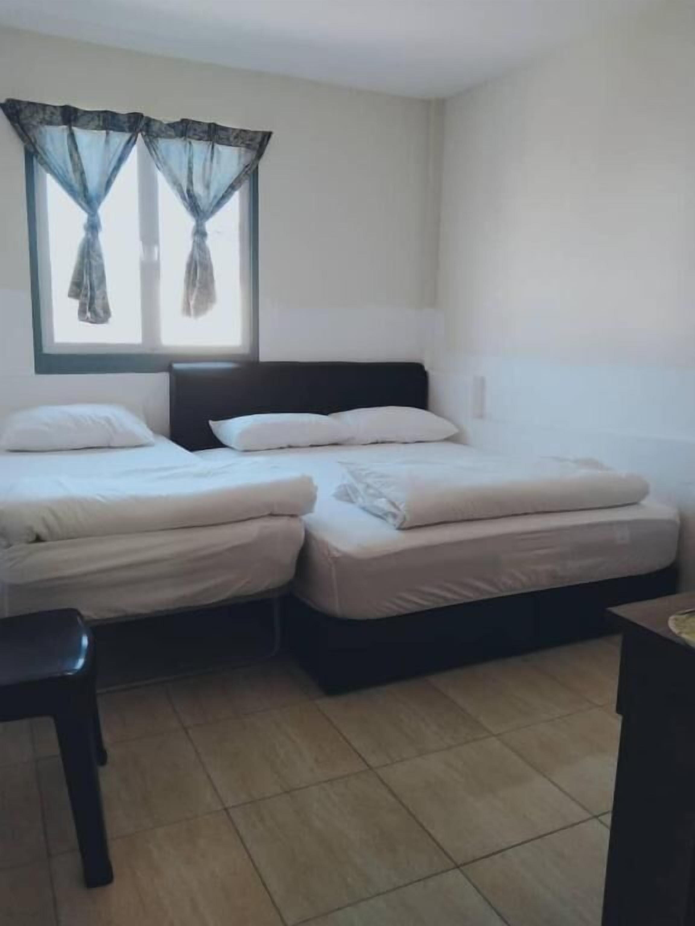 Deluxe Triple Room, City View